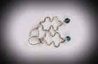 Hand-formed puzzle piece earrings.  $24.00 without dangle,  $28.00 with Swarovski Crystal
